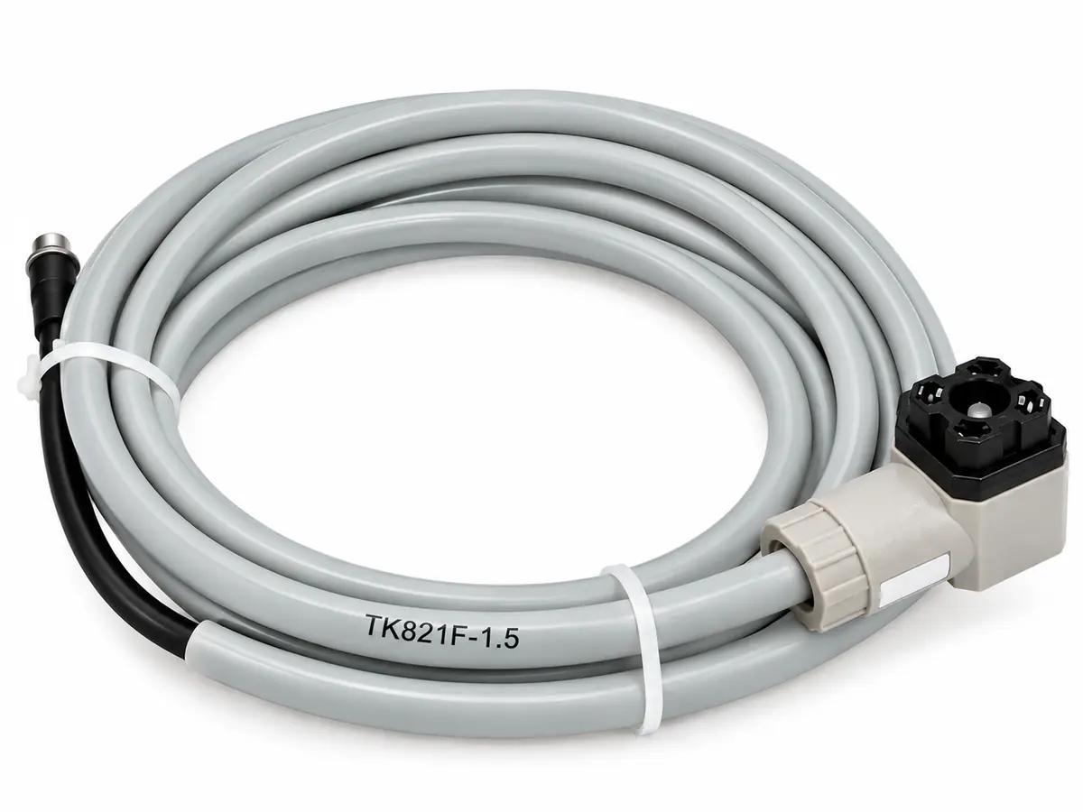 ABB TK821F-1.5 industrial cable assembly with coiled gray cable and industrial connectors on a white background